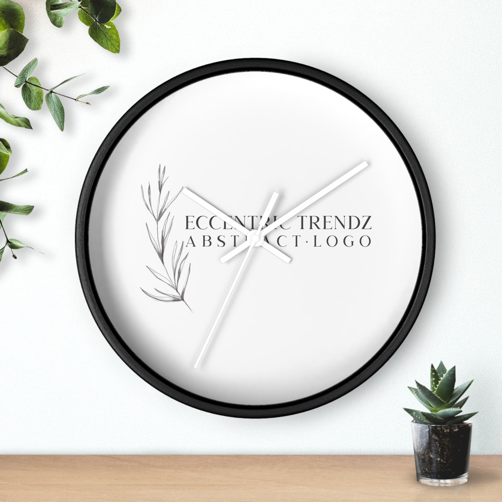 Eccentric Trendz Abstract Logo - Minimal Botanical Wall Clock