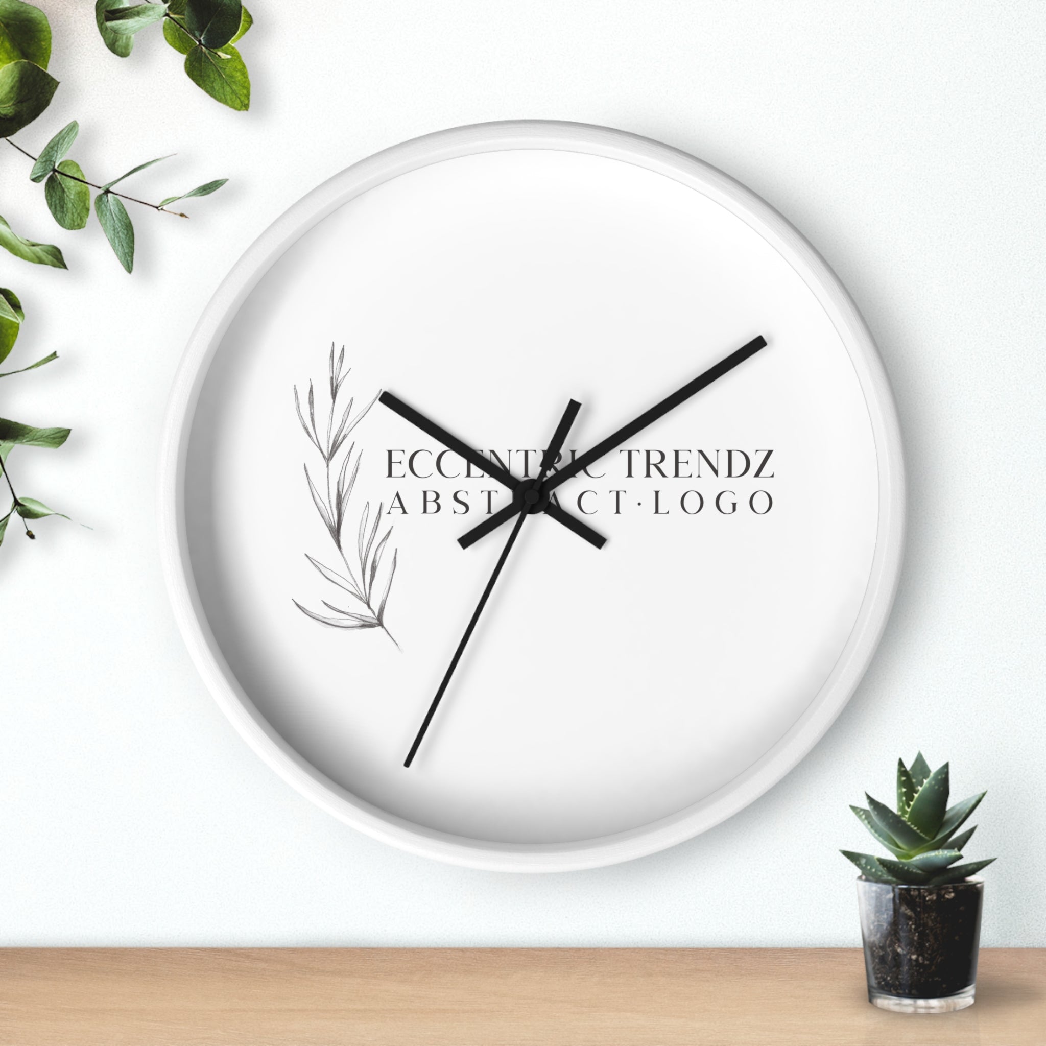 Eccentric Trendz Abstract Logo - Minimal Botanical Wall Clock