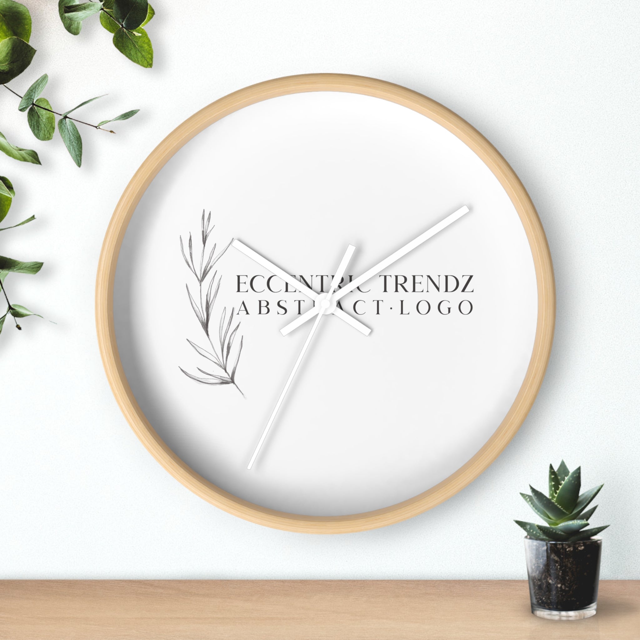Eccentric Trendz Abstract Logo - Minimal Botanical Wall Clock