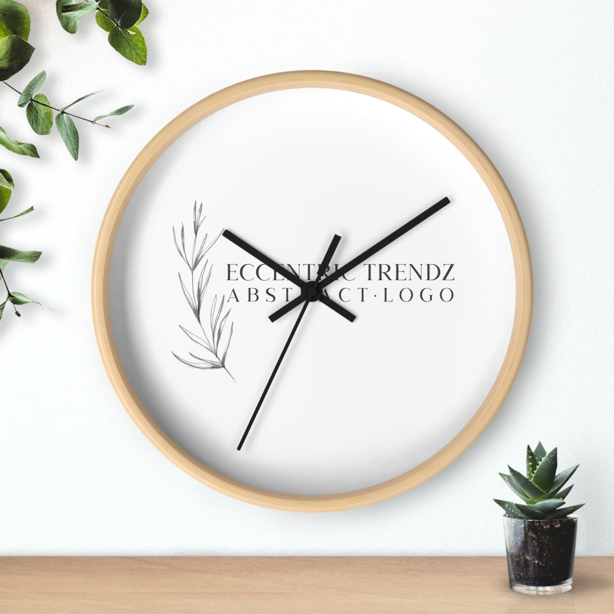 Eccentric Trendz Abstract Logo - Minimal Botanical Wall Clock