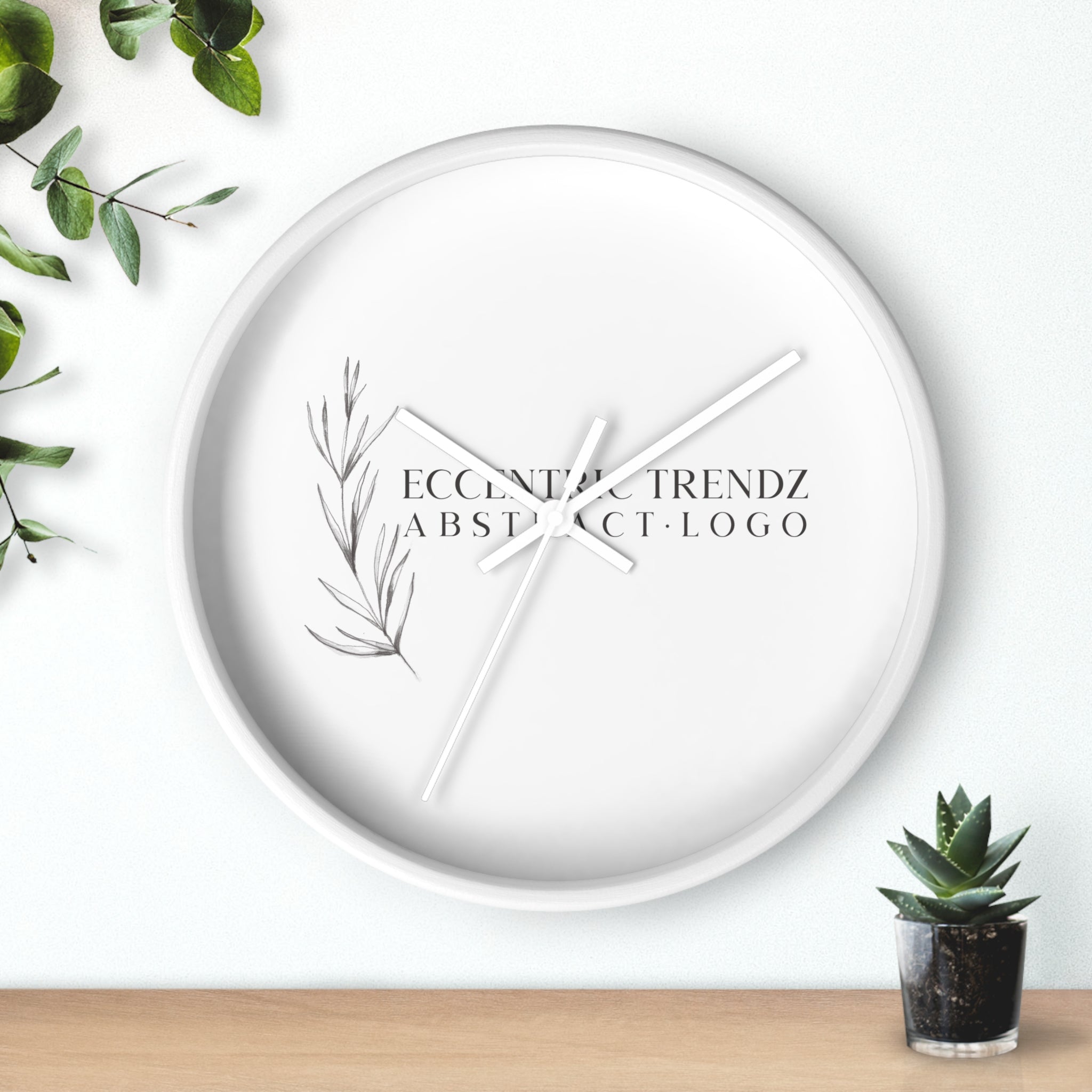 Eccentric Trendz Abstract Logo - Minimal Botanical Wall Clock